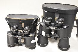 Two pairs of Boots binoculars with cases.