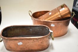 Two Victorian copper planter having brass handles and hot water bottle.