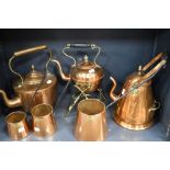 A collection of vintage copper wares, to include kettle, graduated measurers, spirit kettle and