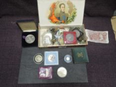 A collection of World Coins and Medallions including Elizabeth II Falklands Island Brunnel 2006 1/25