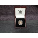 A United Kingdom Royal Mint 1999 Queen Elizabeth II Proof Gold in capsule and in case