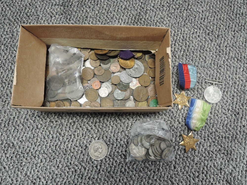 A collection and World Coins including Silver, Italian Sardinia 1827 5 Lira along with WW2 Medals