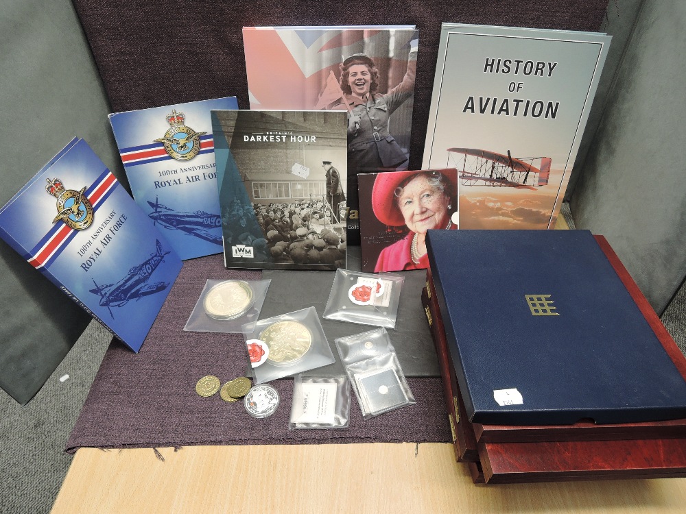 A collection of modern Commemorative Medallion Sets including Windsor Mint, Historic Moments of QEII