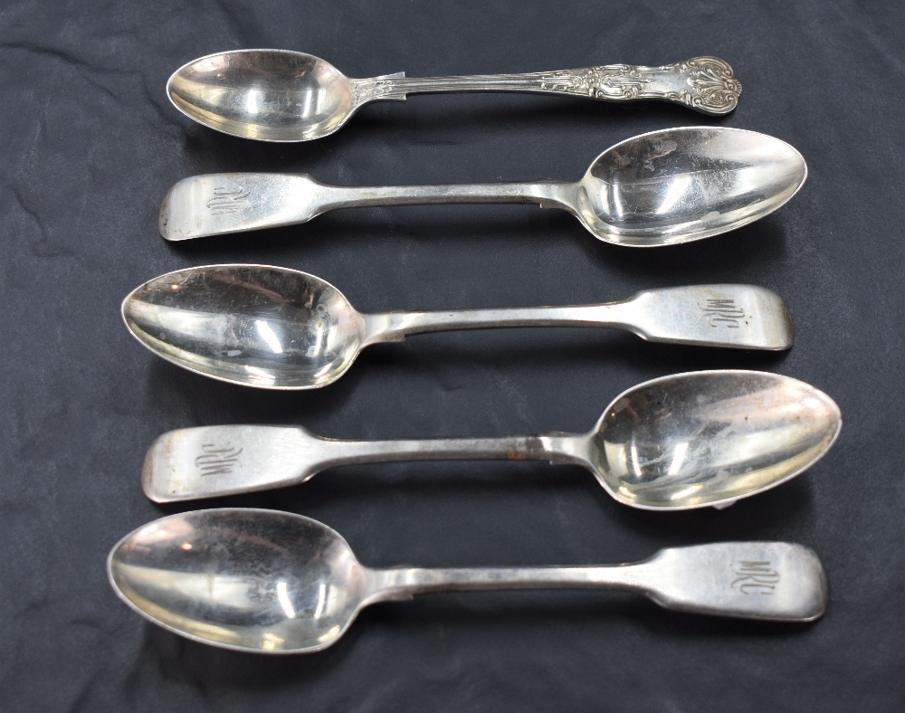 A set of four Victorian silver teaspoons, fiddle pattern with engraved initials MRC and pip to