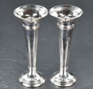 A pair of George V silver vases, of trumpet form with moulded bands of moulded decoration, marks for