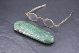 A pair of 19th century adjustable white metal 'Pebbles' spectacles, marked 'Pebbles' and bearing