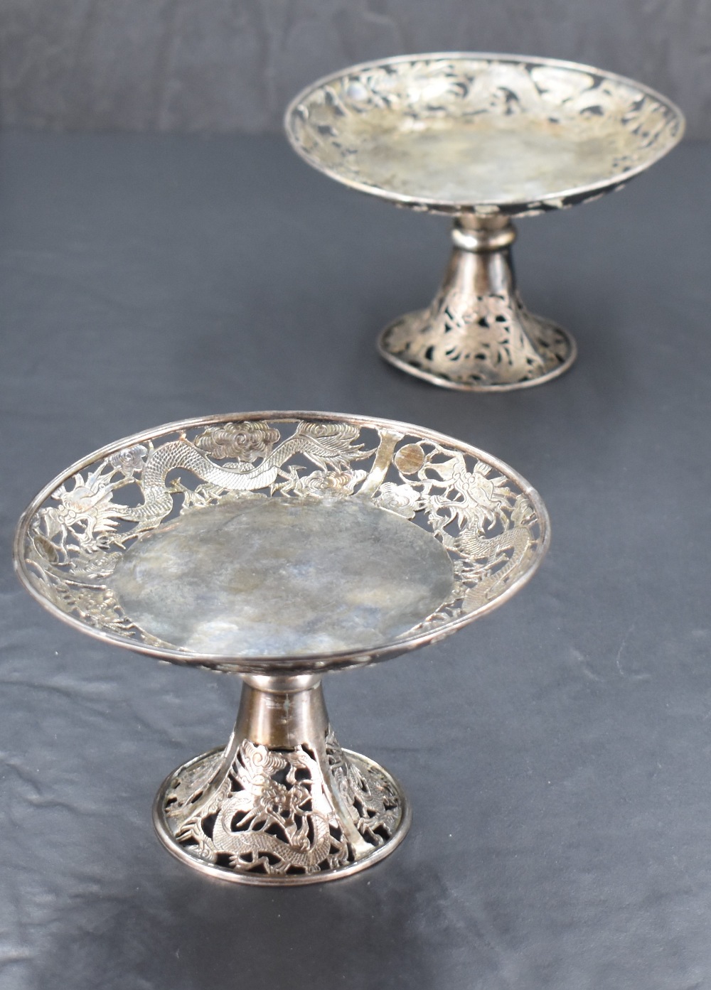 A pair of late 19th/early 20th century Chinese white metal pedestal dishes, of circular form - Image 2 of 5
