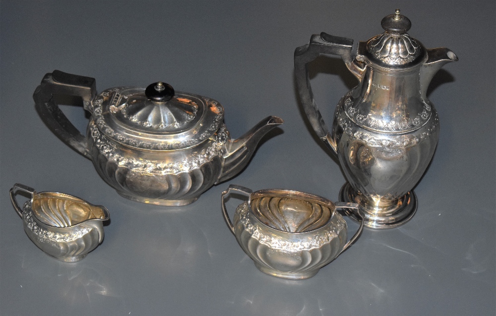 A Victorian silver four piece teaset, comprising teapot, hotwater pot, sugar and cream, of rounded - Image 2 of 3