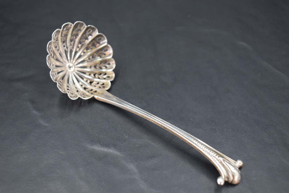 A Victorian silver Onslow pattern sifting spoon, with circular scalloped and pierced bowl, marks for - Image 2 of 4