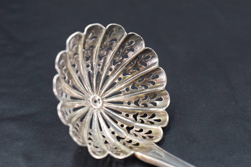 A Victorian silver Onslow pattern sifting spoon, with circular scalloped and pierced bowl, marks for - Image 3 of 4