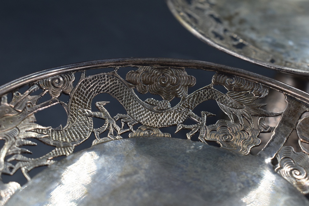 A pair of late 19th/early 20th century Chinese white metal pedestal dishes, of circular form - Image 5 of 5