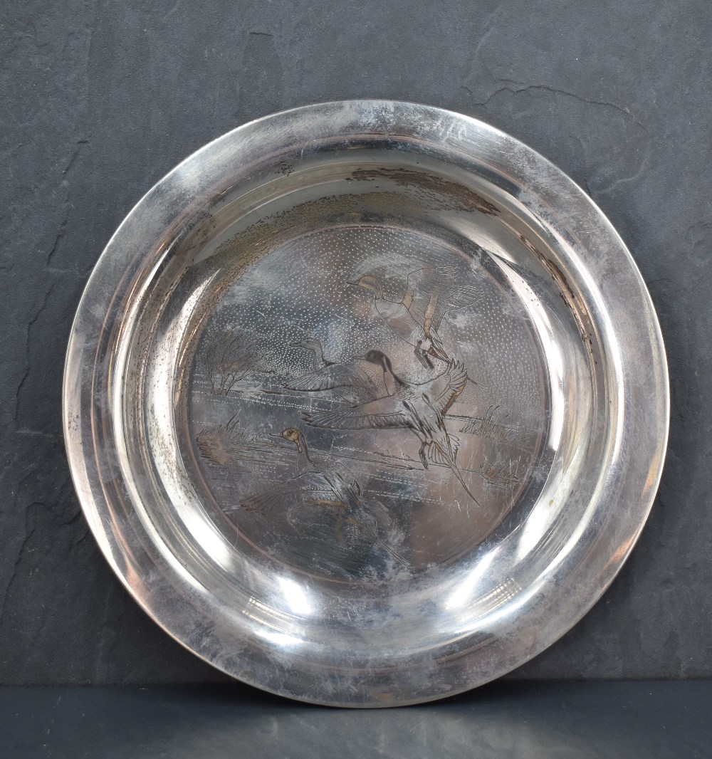 A Queen Elizabeth II silver plate, of dished circular form engraved with flying ducks, marks for