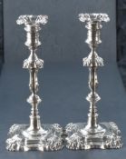 A pair of late Victorian Scottish silver candlesticks, of moulded traditional design with removable