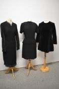 A 1960s black velvet mini dress, a wool shift dress with nylon sleeves and a 1950s black dress