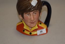 A rare and collectable Royal Doulton The Beatles John Lennon character mug D6797, in fine