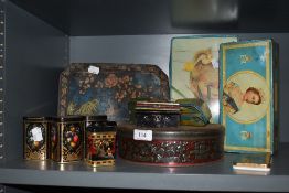 A selection of early 20th century advertising tins including Carr and co and tea tins.