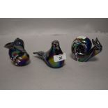 Three modern iridescent glass paper weights in the form of a rabbit, bird and snail.