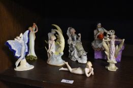 A selection of small sized bisque figures of female dancers nymphs and models