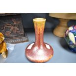 An early 20th century Pilkingtons Royal Lancastrian pottery vase of squat fluted trumpet form having