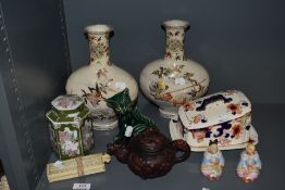 A selection of oriental items including a pair of vases, two nodding head bisque figures and a