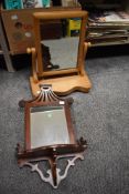 An early 20th century toilet mirror and a modern mahogany Chippendale style wall mirror
