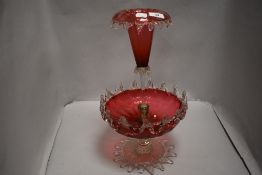 A fine Victorian table centre epergne having cranberry glass with clear glass decoration 42cm tall.