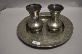 A pair of Arts and Crafts Tudric Pewter vases of fluted trumpet form with a similar hammered