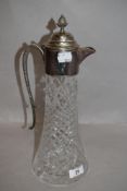 A 20th century clear cut crystal claret jug having silver plated lid and naturalistic ivy vine