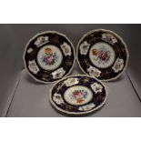 Three late Victorian Royal Crown Derby cabinet display plates hand decorated with scene of flowers