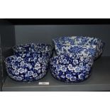 Four vintage ceramic bowls having full chintz floral patterns. One having repair