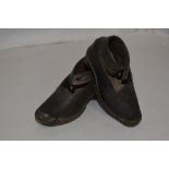 A pair of antique childrens Lancashire clogs in the traditional design, small size 14cm long.