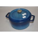 A modern La Cocotte Staub casserole dish in blue enamel.