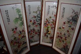 A set of four modern Chinese silk embroidery panels depicting one hundred children.