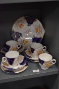 A Late Victorian porcelain tea service in a Gaudy Welsh pattern.