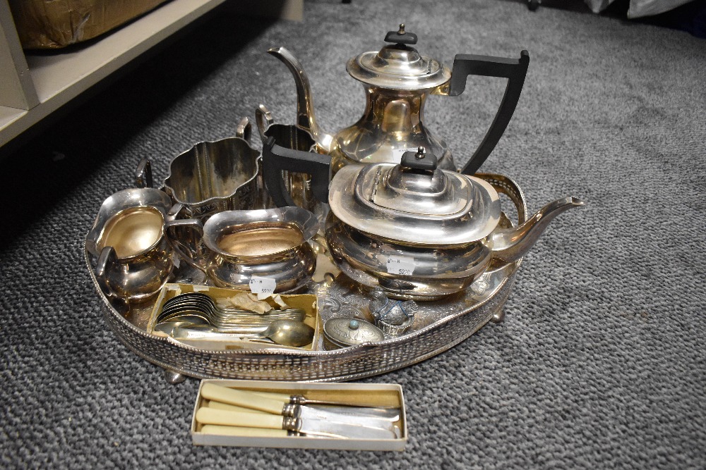 A silver plated gallery tray with a Viners tea set and a small amount of cutlery.