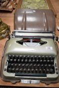 a mid century Imperial Good Companion portable typewriter