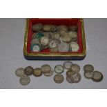 A collection of silver three pence pieces most being 1930's and earlier
