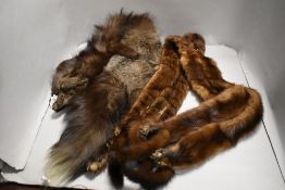 A vintage mink tippet and a silver fox stole.