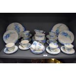 An early 20th century Royal Doulton Blue Iris pattern part tea service in good condition, Rd 776,716