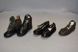 Two pairs of Victorian leather childrens shoes including lace up and slip on.