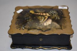 A Victorian papier mache jewellery case highly decorated with natural history theme and inlaid