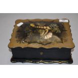 A Victorian papier mache jewellery case highly decorated with natural history theme and inlaid