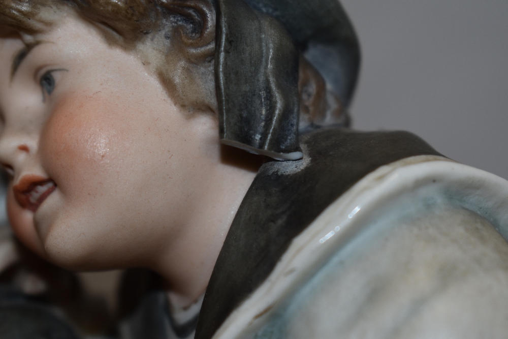 A large early 20th century German bisque figure base of two children dressed as sailors. damage to - Image 2 of 2