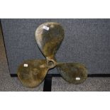 A vintage brass ships propeller marked 98 54A, 44cm wide