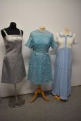 Three vintage 1960s dresses, including early 1960s lace dress in blue, maxi dress with gingham skirt
