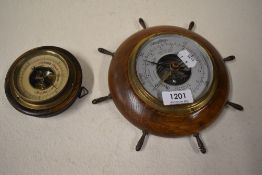 Two small barometers one of ships wheel design.