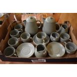 A mid century Prinknash part tea service in a mottle green glaze.