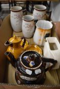 A mixed lot of ceramics including late 19th Century teapot and trivet with relief design reading '