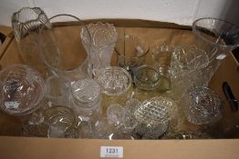 A selection of cut glass items including Vases, rose bowls and candlesticks etc.