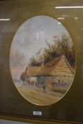 Robert Thornton Wilding, (19th/20th century), a watercolour, oval, thatched farmstead, signed and